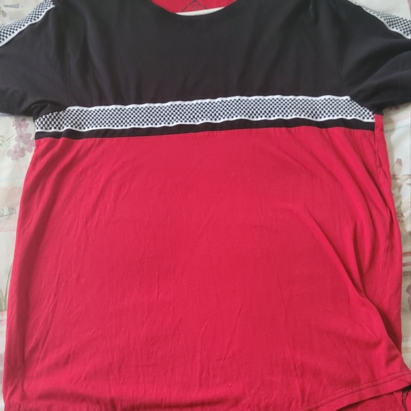 A red, black, and checker striped shirt. Size-large - Picture 1 of 1